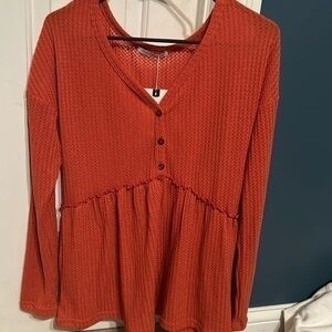 Women’s orange blouse
